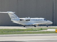 N742JS @ MKE - long range shot from car park at MKE - by magnaman