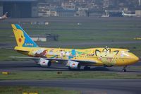 JA8957 @ RJTT - Yellow Pokemon B744 arriving in Haneda - by FerryPNL