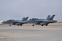 168767 @ KBOI - Parked on the south GA ramp with 168770. VAQ-134 Garudas, NAS Whidby Island, WA. - by Gerald Howard