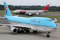 HL7495 @ RJAA - Korean B744 almost at its gate - by FerryPNL