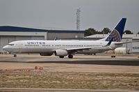 N37437 @ KBOI - Turning onto RWY 28R from Alpha. - by Gerald Howard