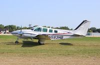 N583MB @ KOSH - Beech 58TC - by Mark Pasqualino