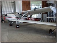 N1586C @ SUAA - Inside hangar at SUAA - by Amilcar Carriqui Duarte
