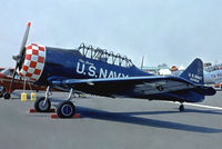 G-SUES @ EGKB - G-SUES   (41-33854) North American AT-6D Harvard III [88-14552] Biggin Hill~G 15/05/1982. From a slide.