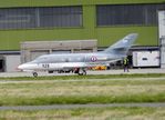 129 @ EGQL - 57S Falcon 10MER - by Mike stanners