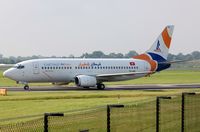 TS-IEE @ EGCC - Karthago B733 arriving in MAN - by FerryPNL