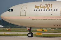 A6-EYI @ EGCC - Etihad A332 front office. - by FerryPNL