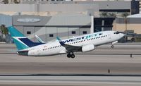 C-FLWJ @ KLAS - Boeing 737-7CT - by Mark Pasqualino