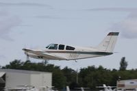 N1BF @ KOSH - Beech E55 Baron  C/N TE-961, N1BF - by Dariusz Jezewski www.FotoDj.com