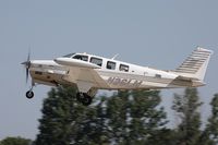 N36LM @ KOSH - Beech A36TC Bonanza 36  C/N EA-67, N36LM - by Dariusz Jezewski www.FotoDj.com