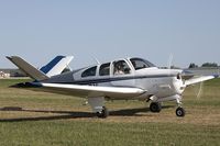 N9520Y @ KOSH - Beech P35 Bonanza  C/N D-7016, N9520Y - by Dariusz Jezewski www.FotoDj.com