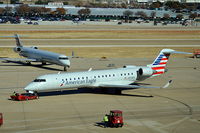 N718EV @ KDFW - Pushback terminal B - by Nelson Acosta Spotterimages