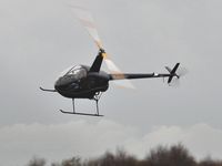 G-MDKD @ EGFH - Resident R-22 operated by HeliAir-Wales. - by Roger Winser