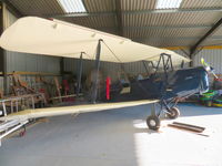 N1937D - Stored in hangar at Pent Farm Airfield, Kent in new blue livery. - by Chris Holtby