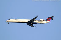 N135EV @ KJFK - Bombardier CRJ-900ER (CL-600-2D24) - Delta Connection (ExpressJet Airlines)   C/N 15225, N135EV