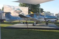 C-FVDC @ KOSH - Diamond DA-62 - by Mark Pasqualino