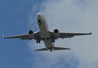 VH-VZQ @ NZAA - on long finals to AKL from outside Countdown Manukau City - by Magnaman