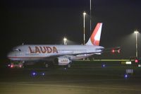 A7-ADJ @ EGSH - Seen at Norwich being towed from the paint shop , repainted into Laudamotion new livery - by AirbusA320