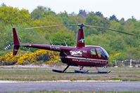 G-LHXL @ EGLK - G-LHXL   Robinson R-44 Raven I [1702] (Phoenix Helicopters Academy Ltd) Blackbushe~G 02/05/2015. Written off 17-08-2015
