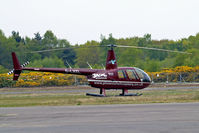 G-LHXL @ EGLK - G-LHXL   Robinson R-44 Raven I [1702] (Phoenix Helicopters Academy Ltd) Blackbushe~G 02/05/2015. Written off 17-08-2015