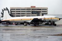 HH-SCA @ MIA - Looking very smart as she's loaded for another flight, MIA March 1990 - by Goat66