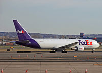 N123FE @ KEWR - This new Federal Express cargo plane makes its way to the extensive cargo terminal at the south end of Newark Airport. - by Daniel L. Berek