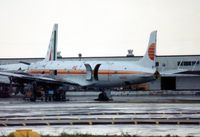 N44DG @ MIA - Awaiting attention at MIA during March 1990 and displaying the part titlle and colours of a previous opertator, PAT (Petroleum Air Transport) - by Goat66