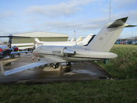 C-FJCB @ EGGW - looks almost military colour scheme - by Magnaman