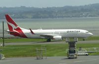 VH-XZE @ NZAA - at AKL from car park - by Magnaman