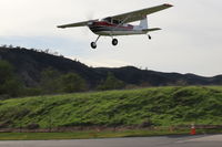 N184TM @ SZP - 1956 Cessna 180, Continental TSIO-520 285 Hp big turbo upgrade, on final Rwy 04 - by Doug Robertson
