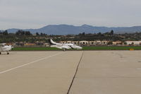 N142TL @ CMA - 2010 EMBRAER SA EMB-500 PHENOM 100, 2 Pratt & Whitney-Canada PW617 Turbofans with FADEC, each rated at 1,695 lb st, taxi to Transient Ramp - by Doug Robertson