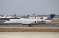 N937SW @ KORD - CL-600-2B19 - by Mark Pasqualino