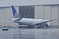 N219UA @ KSFO - Rainy day. SFO 2019. - by Clayton Eddy