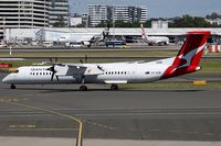 VH-QOB @ YSSY - taxiing - by Bill Mallinson