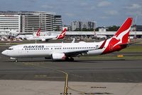 VH-XZK @ YSSY - TAXIING - by Bill Mallinson
