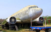 N2271D - Dismantled in a lumber yard in Phachi on road #3056, Province of Ayutthaya / Thailand - by Jean M Braun