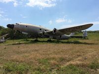 HI-393 @ MDSD - Derelict at SDQ airport, southwest corner of the airport. - by Scott Hickman