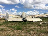 HI-393 @ MDSD - Aft view.
Derelict at SDQ airport, southwest corner of the airport. - by Scott Hickman