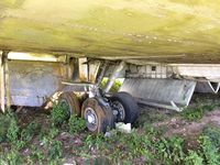 CS-TBI @ MDSD - Right main gear.
Derelict at SDQ airport, on the southwest corner of the airport. - by Scott Hickman