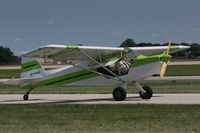 N742MG @ KOSH - Taxiing for departure, AirVenture 2018 - by alanh