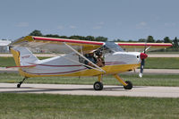 N715CF @ KOSH - Taxiing for departure, AirVenture 2018 - by alanh