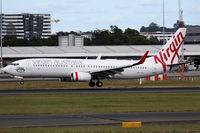 VH-YFL @ YSSY - onto 16R - by Bill Mallinson