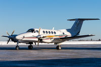 C-GAEW @ CYQM - Parked in front of it's hangar. - by Tim Lowe
