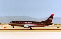 N521AU @ KLAS - Las Vegas arrival on 25L - from the E Sunset Ave Airpark - by Tom Vance