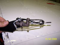 N29MH @ CYZV - With cable ties, the holder was forced into position, so that the Bowden cable remained threaded in its holder. 
Eventually, the plane stopped in CYZV because the owner could not pay the bills. If you want to know more, feel free to contact me. - by Stefan Dudzus