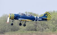 G-OUGH @ EGFH - Resident Yak-52/DOSAAF/Yellow 19. - by Roger Winser