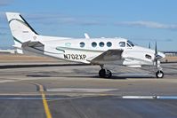 N702XP @ KBOI - Taxiing onto the north GA ramp.