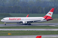 OE-LAX @ LOWW - Landing on RWY 11 on a cloudy rainy day - by HubAir