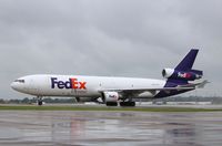N593FE @ KMEM - MD-11F - by Mark Pasqualino