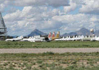 159130 @ DMA - a row of LC-130s at davis monthan - by olivier Cortot